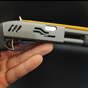 Mini Diecast metal and polymer rubber band shotgun!